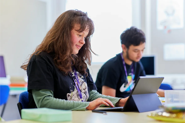 Graphic Design degree students working on projects in class 2