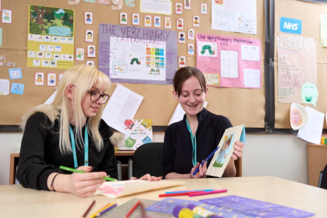 Early Year Level 2 students working on materials