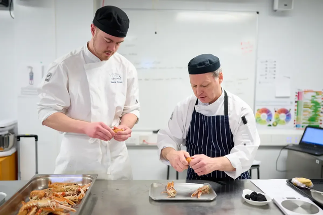Hospitality student and tutors working together